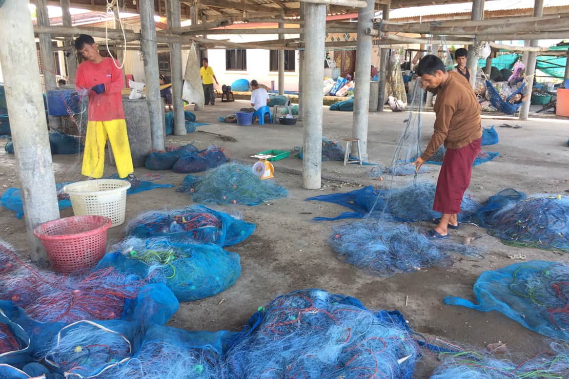 Blue swimming crab fishermen in Thailand prepare their fishing gear.